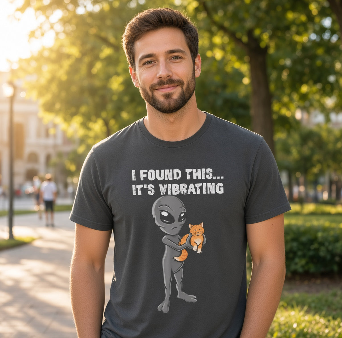 Alien Holding Cat T-Shirt | Funny "I Found This... It's Vibrating" Space Cat Tee